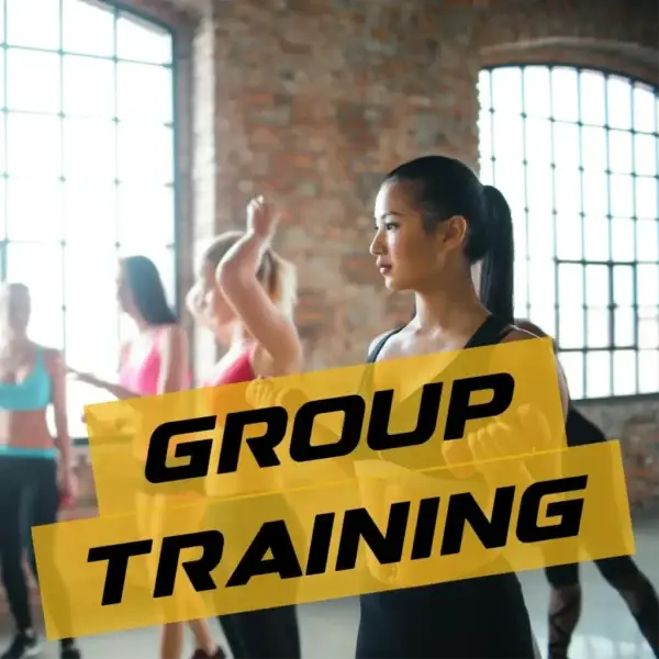 Clients warming up for a group training session, with the text 'group training' displayed.